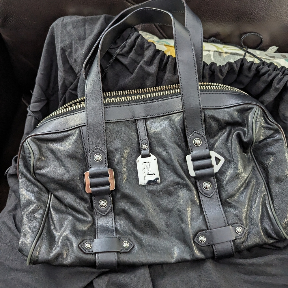 L A.M.B black leather handbag